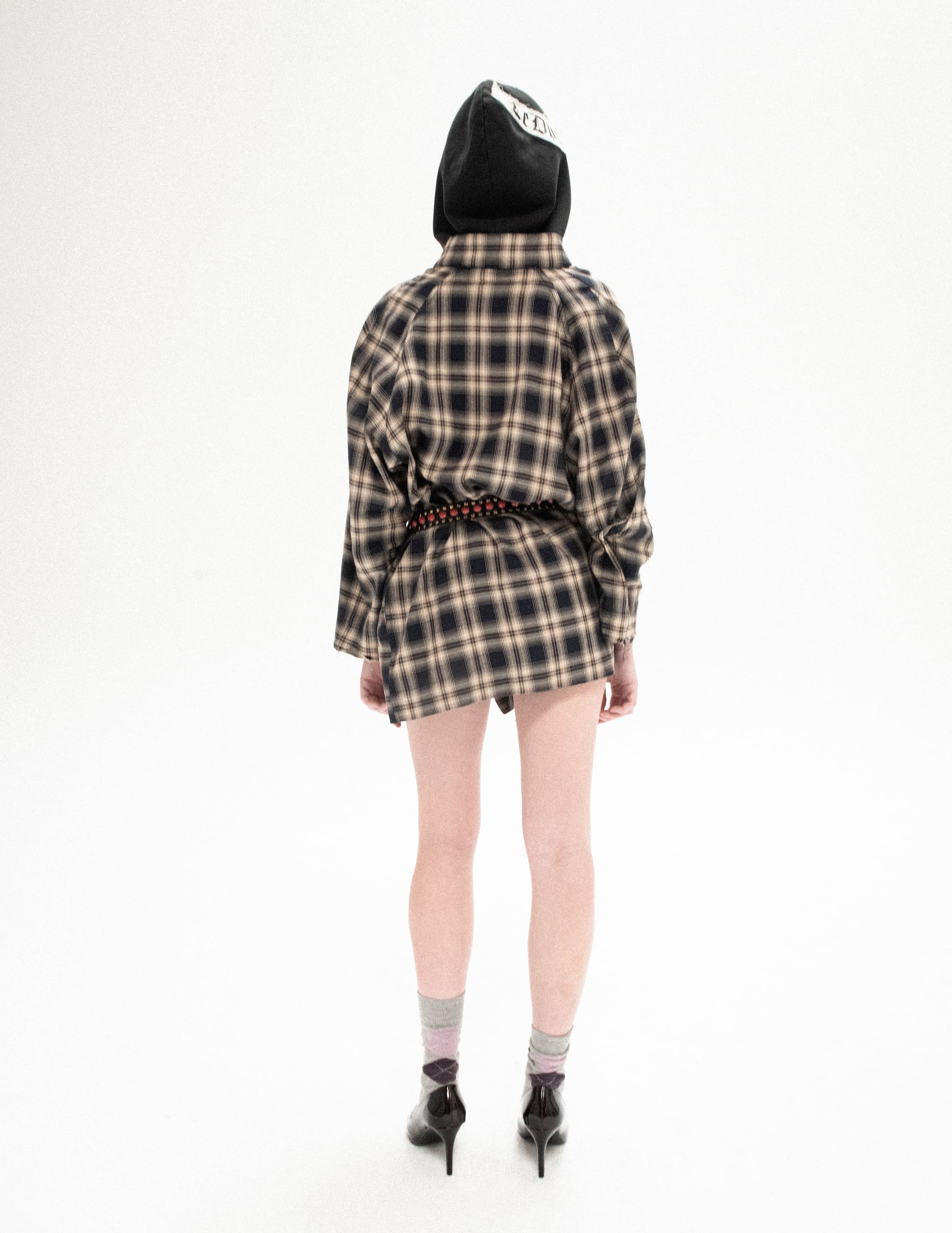 Ruffled shirt “confessional”